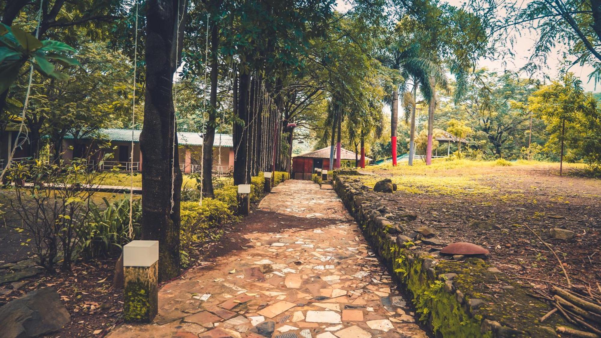 Whispering Peepul Resort Badlapur Bagian luar foto